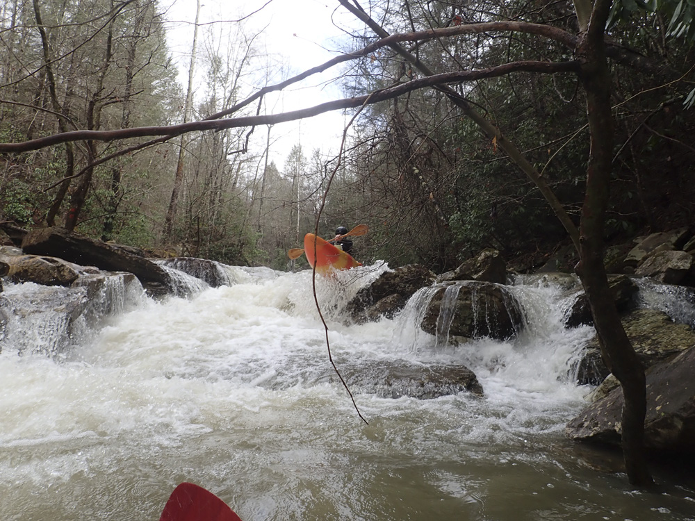 Left Slot (IV to IV). Another steep ledge, this time best run off the